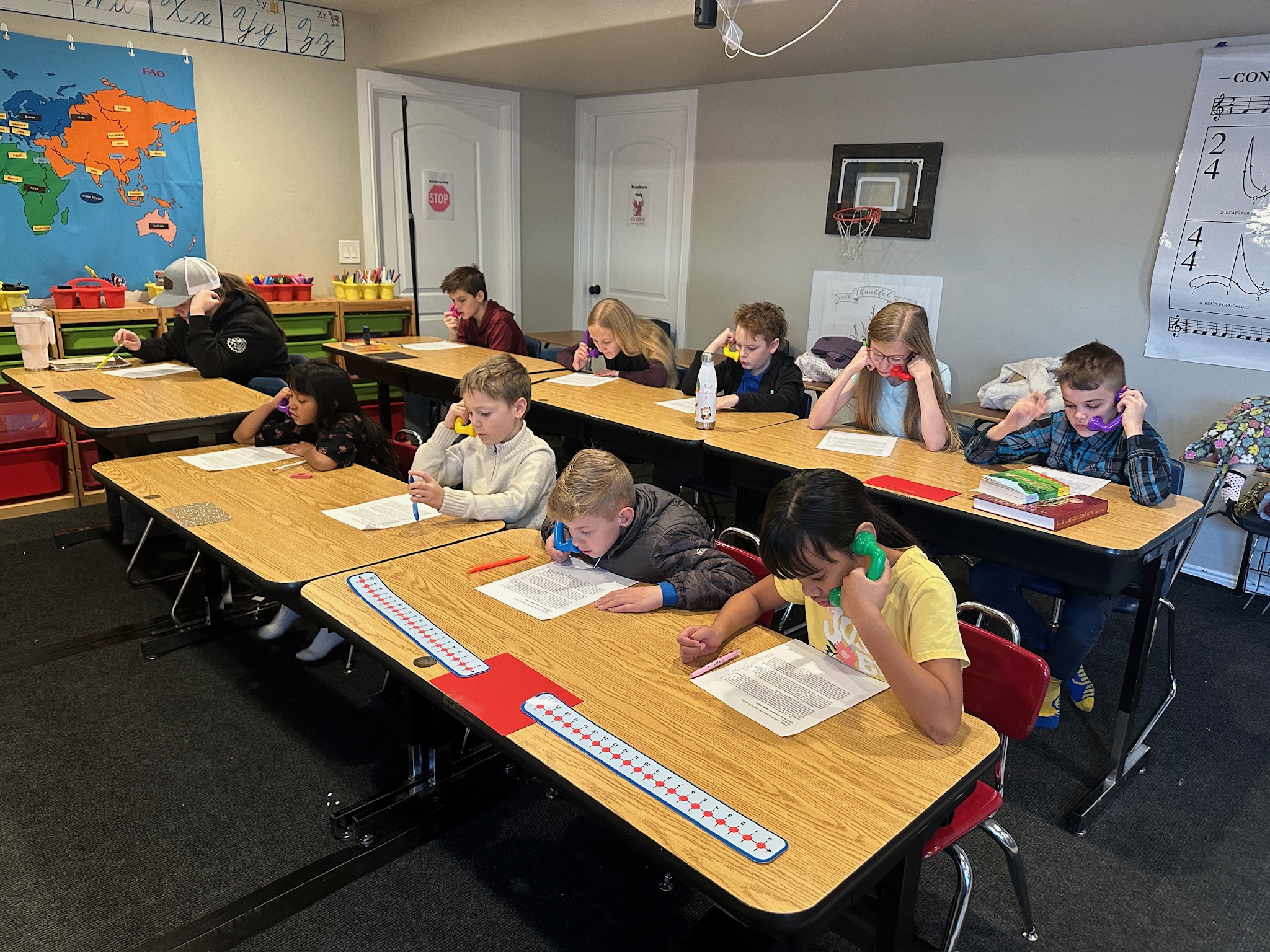 Microschool students practicing reading